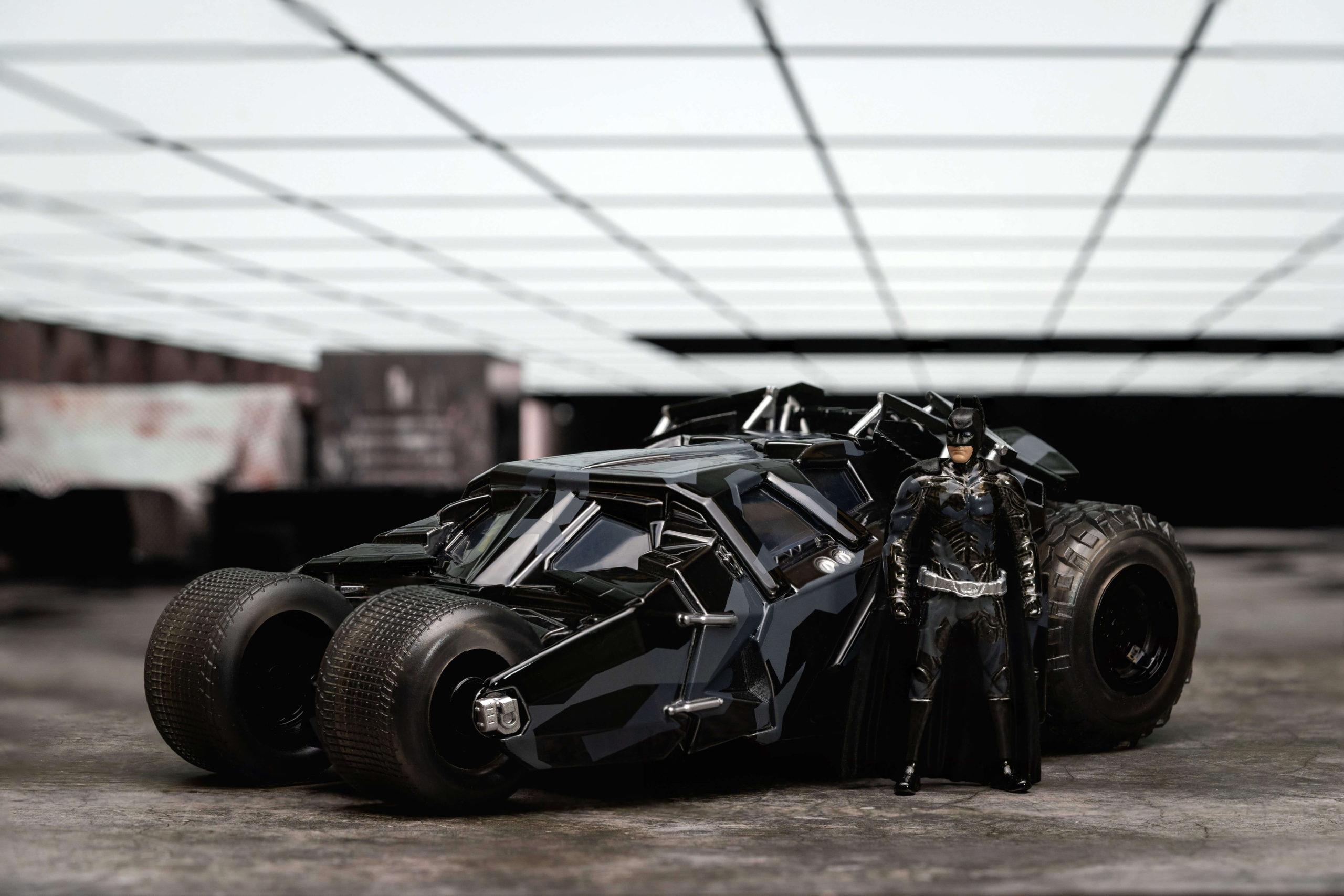 Batman: Dark Knight Trilogy - Batmobile with Batman (Black Camo) SDCC 2023 Exclusive 1:24 Scale